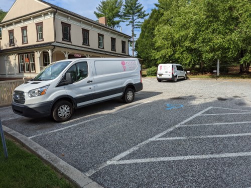 Commercial auto insurance flower delivery van sitting in a parking lot