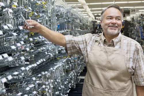 Happy Business Owner checking inventory.